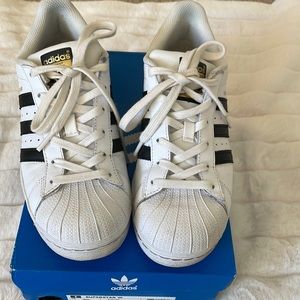 Adidas Superstar shoes, size 7, black stripes